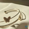 دستبند زنانه طلایی طرح پروانه نگین دار Bracelet-8461-L