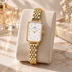 ساعت زنانه DW مستطیل طلایی صفحه سفید نگینی DW-11495-L